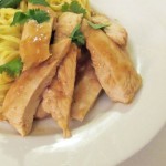 Chicken baked in ginger and lime with noodles