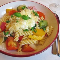 Roast vegetables with creamy pasta, cheese and salad