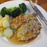 Meatloaf with crushed garlic and rosemary new potatoes and broccoli